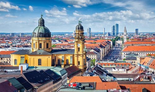 Aerial view of Munich over Theatine Church of St. Cajetan (Theatinerkirche St. Kajetan) and Odeonplatz, Munich, Bavaria, Germany in day time